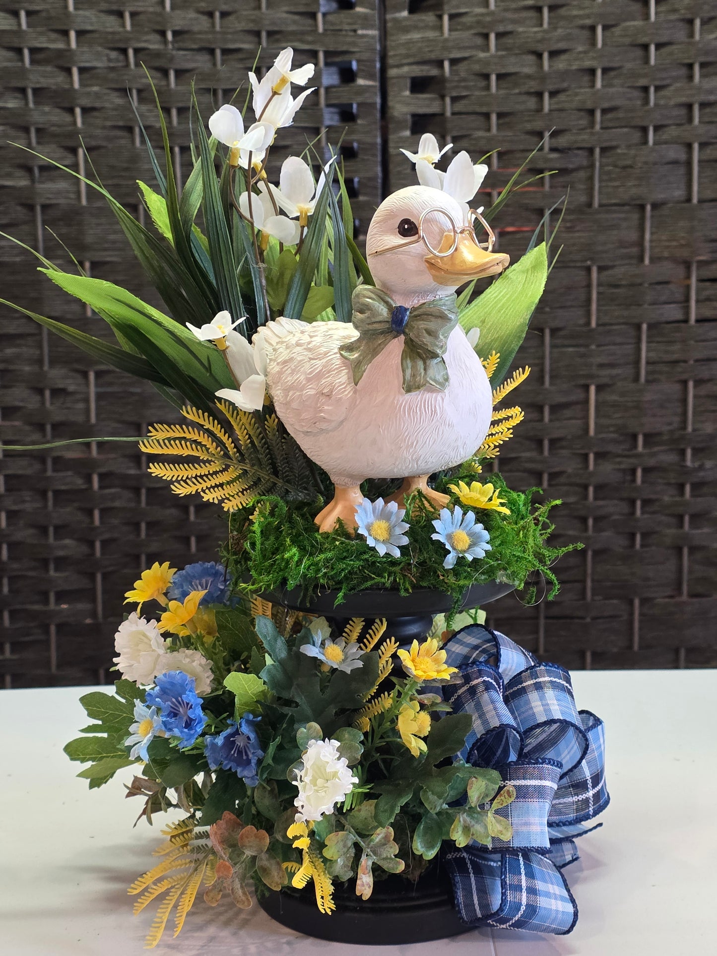 Duck on pedestal